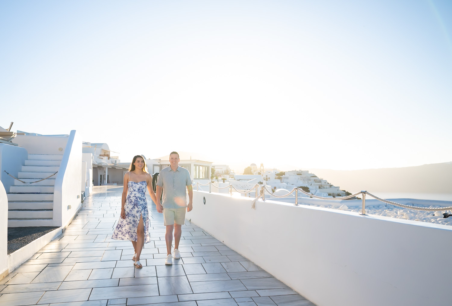Surprise proposal photoshoot overlooking the Santorini caldera